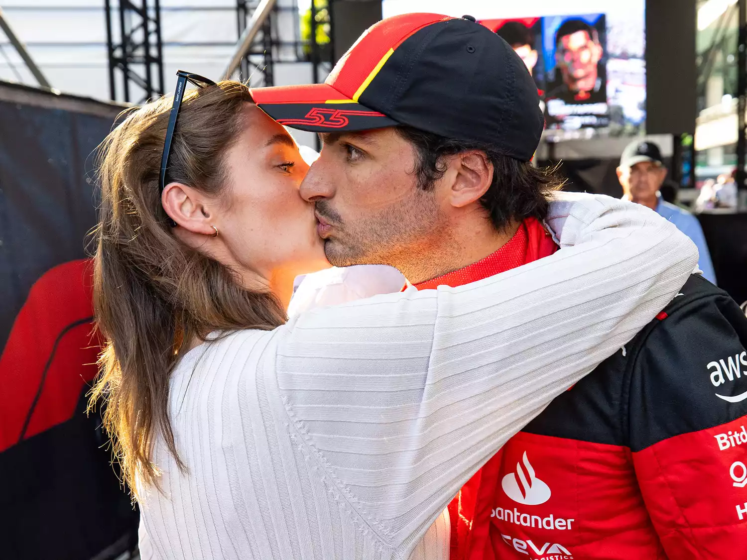 Rebecca kissing Carlos Sainz